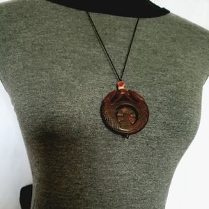 Handsome double dragon soapstone necklace in brown/orange